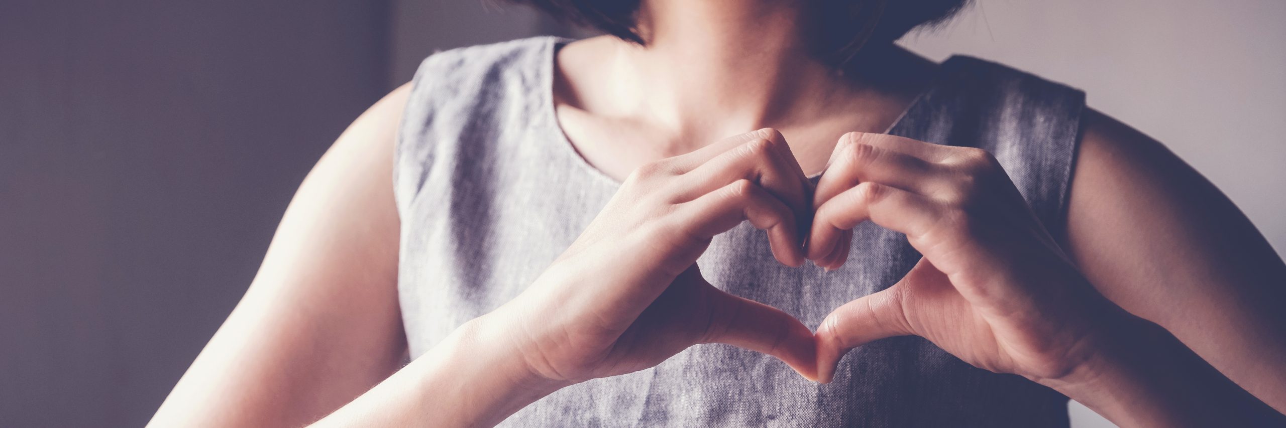 Woman Making Hands In Heart Shape Heart Health Insurance social Responsibility